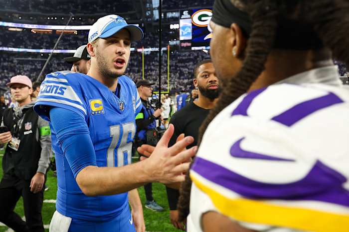Dec 24, 2023; Minneapolis, Minnesota, USA; Detroit Lions quarterback Jared Goff (16) and Minnesota Vikings wide receiver K.J. Osborn (17) shake hands after the game at U.S. Bank Stadium. With the win the Detroit Lions clinched the NFC North.